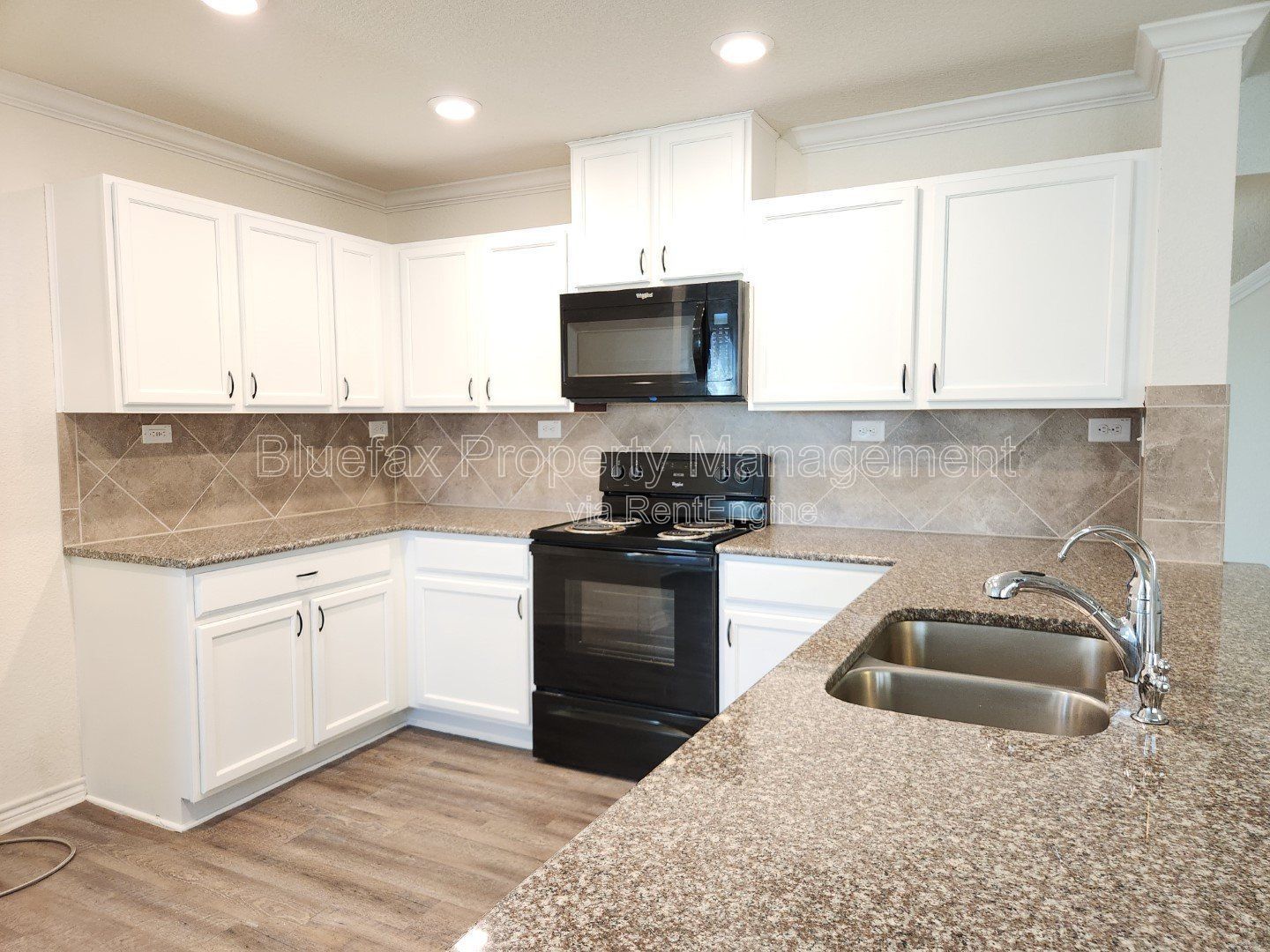HUGE Covered Patio with Built In Counters, a Refrigerator and a Place for Your Grill! property image