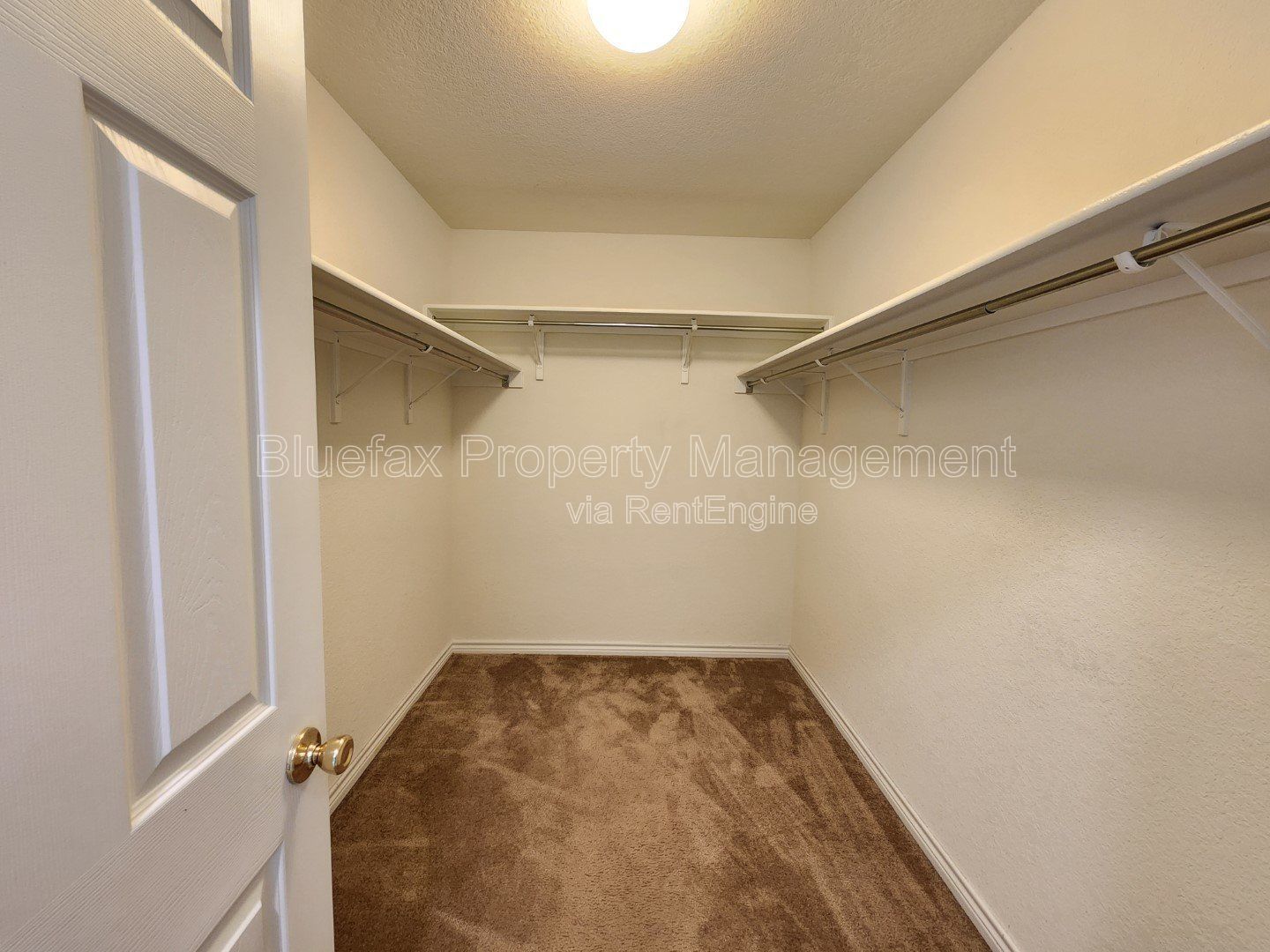 HUGE Covered Patio with Built In Counters, a Refrigerator and a Place for Your Grill! property image