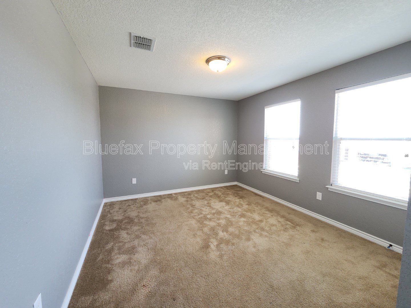 HUGE Covered Patio with Built In Counters, a Refrigerator and a Place for Your Grill! property image