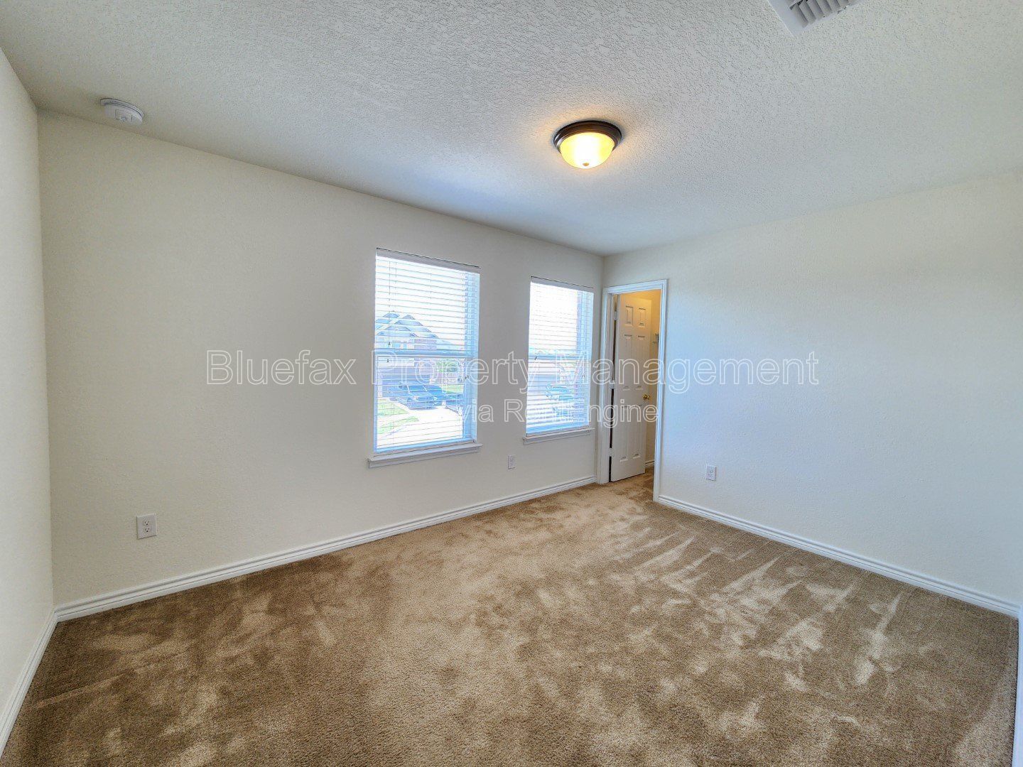HUGE Covered Patio with Built In Counters, a Refrigerator and a Place for Your Grill! property image