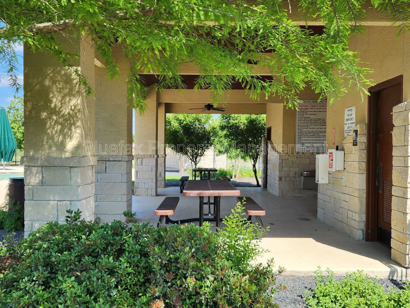 HUGE Covered Patio with Built In Counters, a Refrigerator and a Place for Your Grill! property image