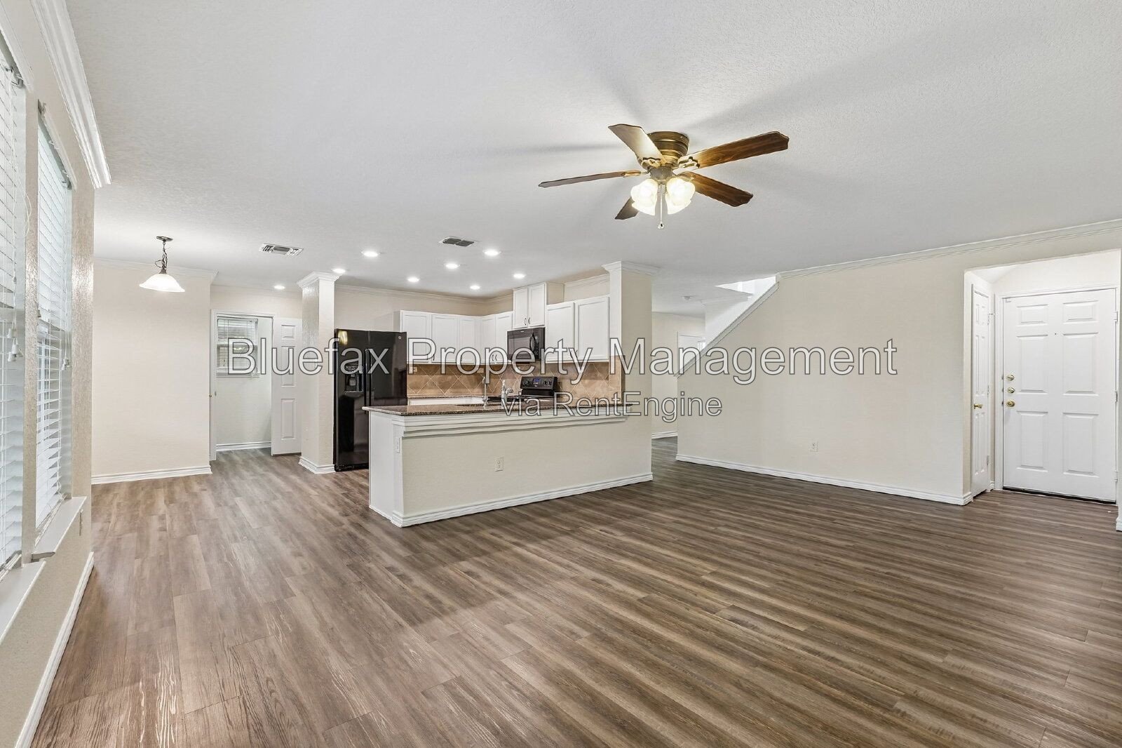 HUGE Covered Patio with Built In Counters, a Refrigerator and a Place for Your Grill! property image