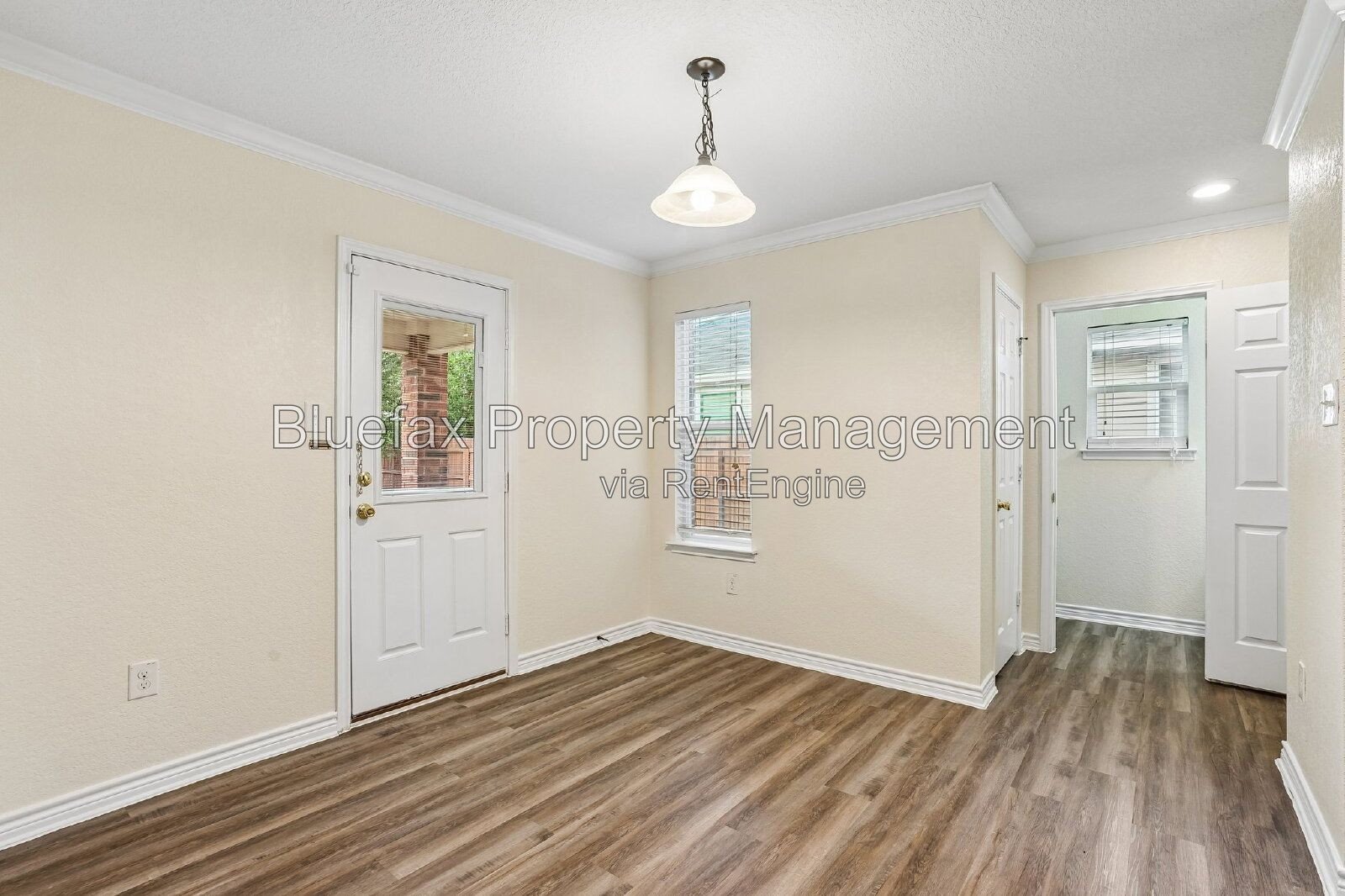 HUGE Covered Patio with Built In Counters, a Refrigerator and a Place for Your Grill! property image