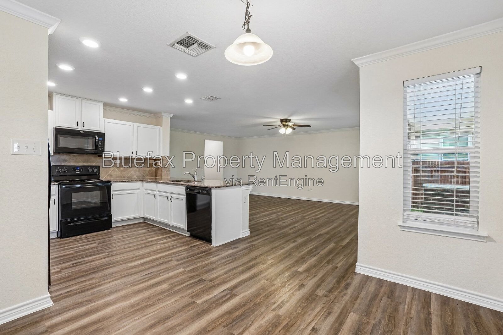 HUGE Covered Patio with Built In Counters, a Refrigerator and a Place for Your Grill! property image