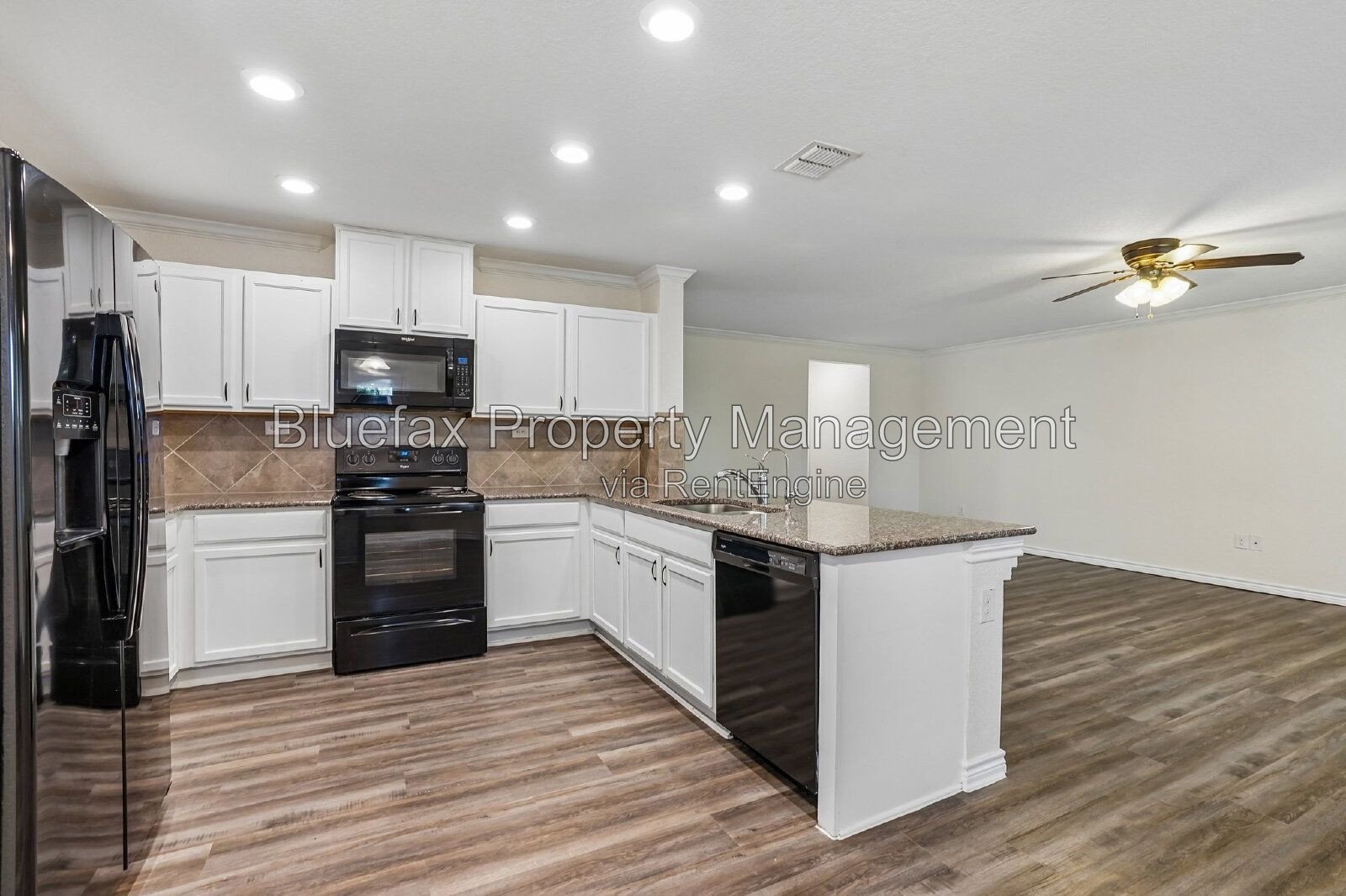 HUGE Covered Patio with Built In Counters, a Refrigerator and a Place for Your Grill! property image