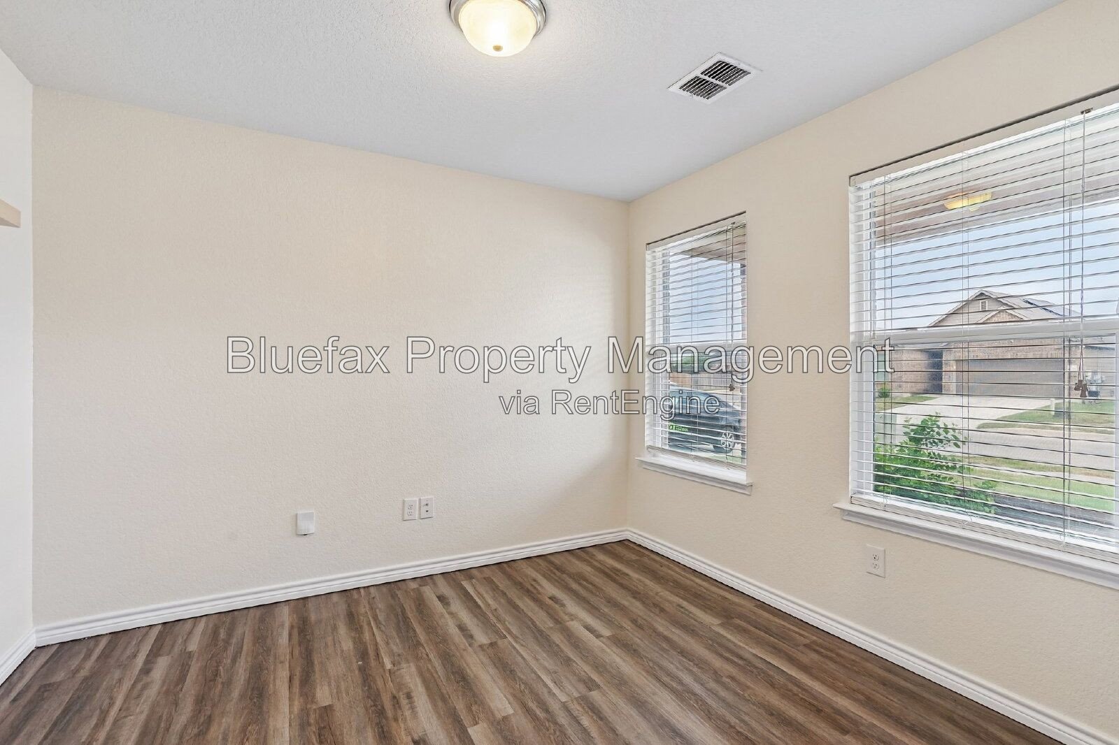 HUGE Covered Patio with Built In Counters, a Refrigerator and a Place for Your Grill! property image