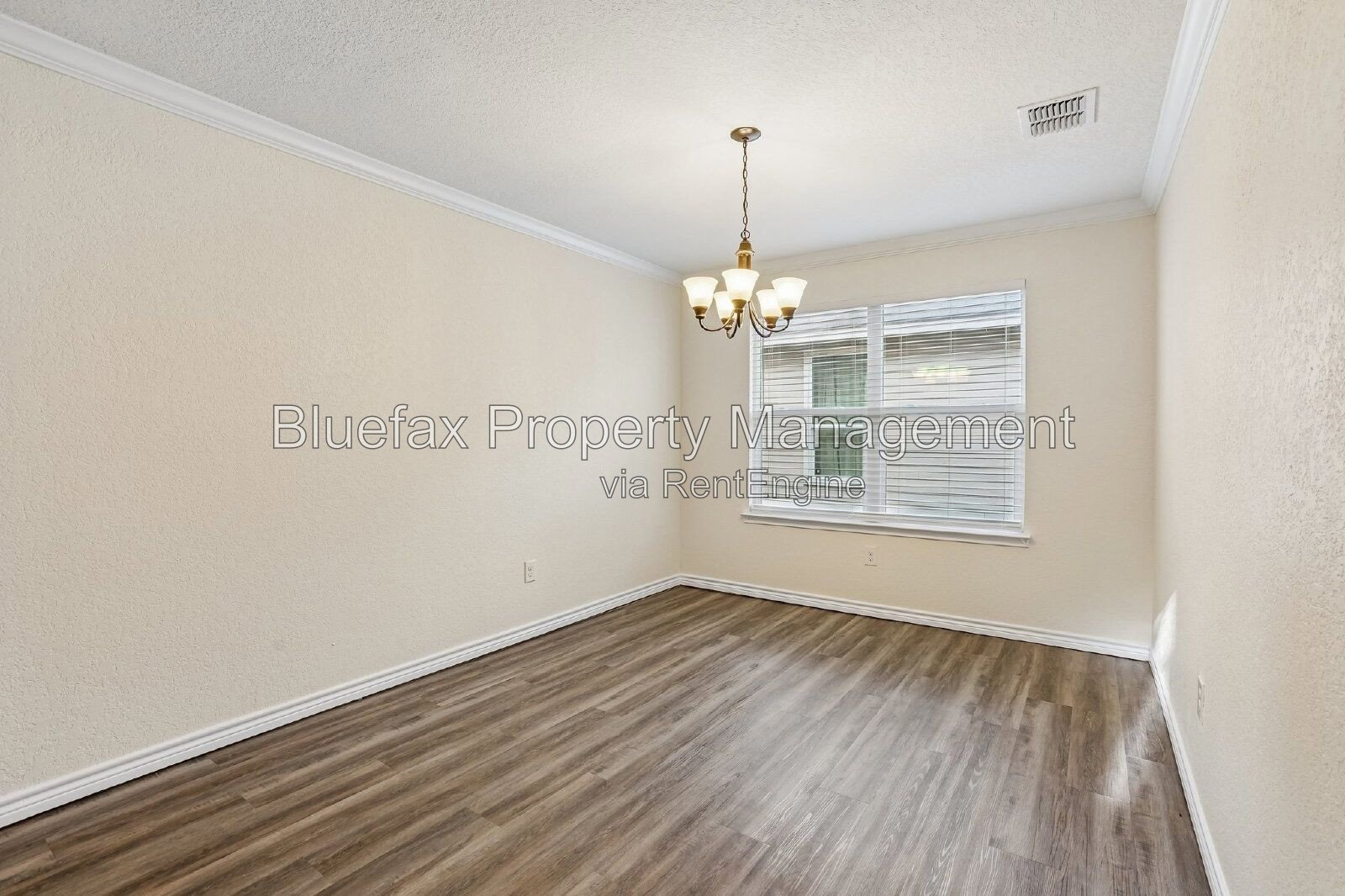 HUGE Covered Patio with Built In Counters, a Refrigerator and a Place for Your Grill! property image