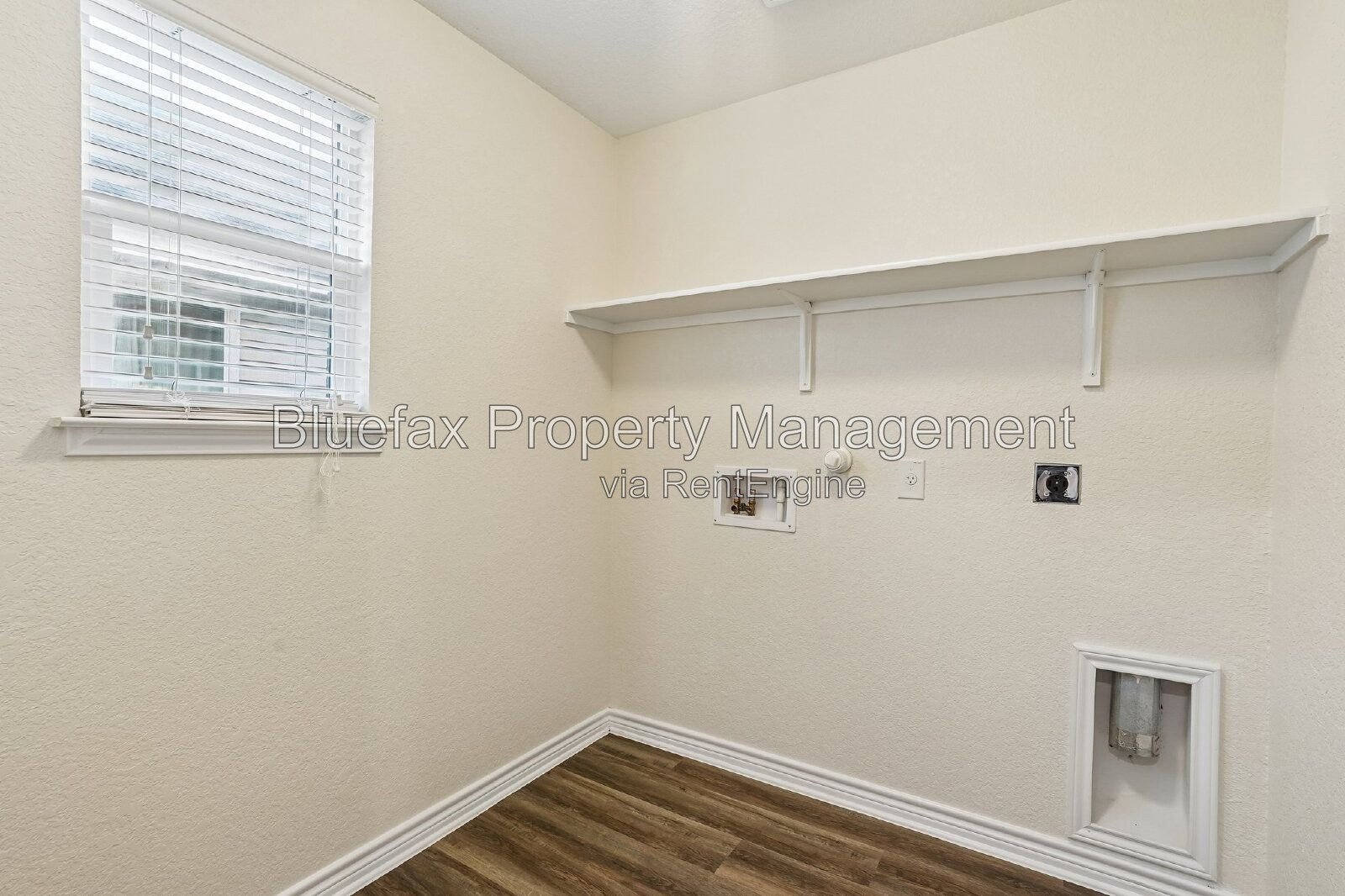 HUGE Covered Patio with Built In Counters, a Refrigerator and a Place for Your Grill! property image