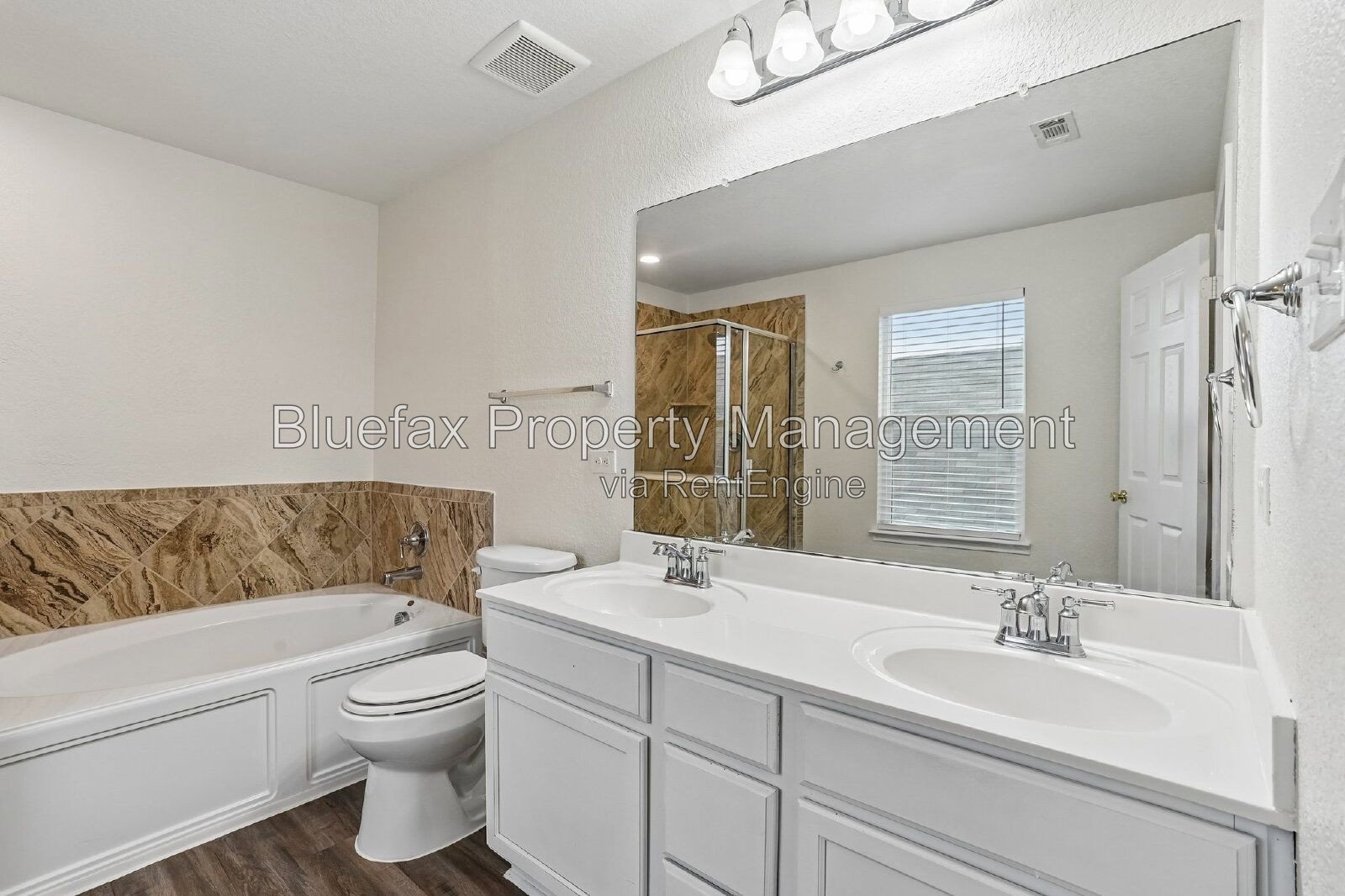 HUGE Covered Patio with Built In Counters, a Refrigerator and a Place for Your Grill! property image