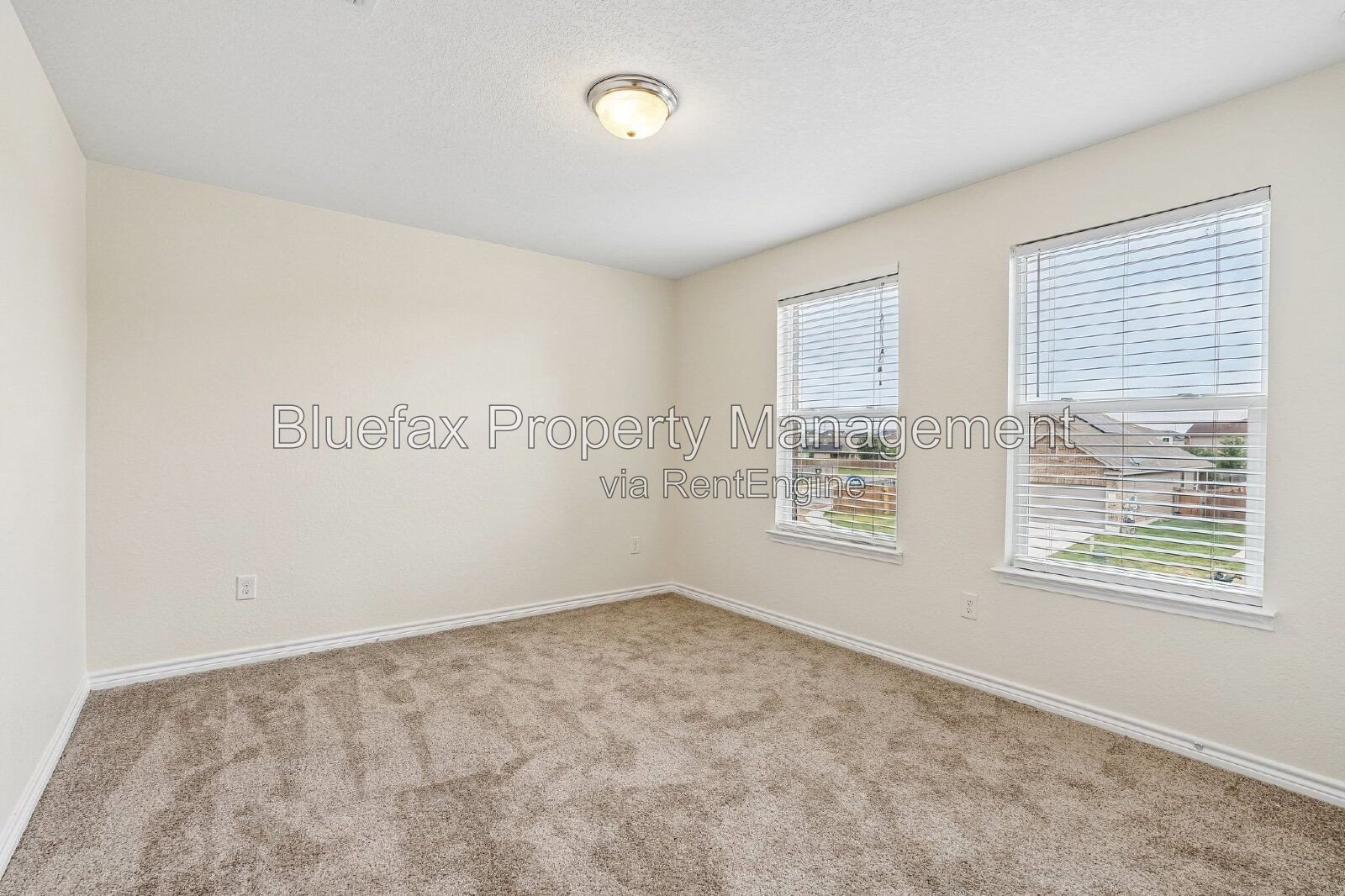 HUGE Covered Patio with Built In Counters, a Refrigerator and a Place for Your Grill! property image