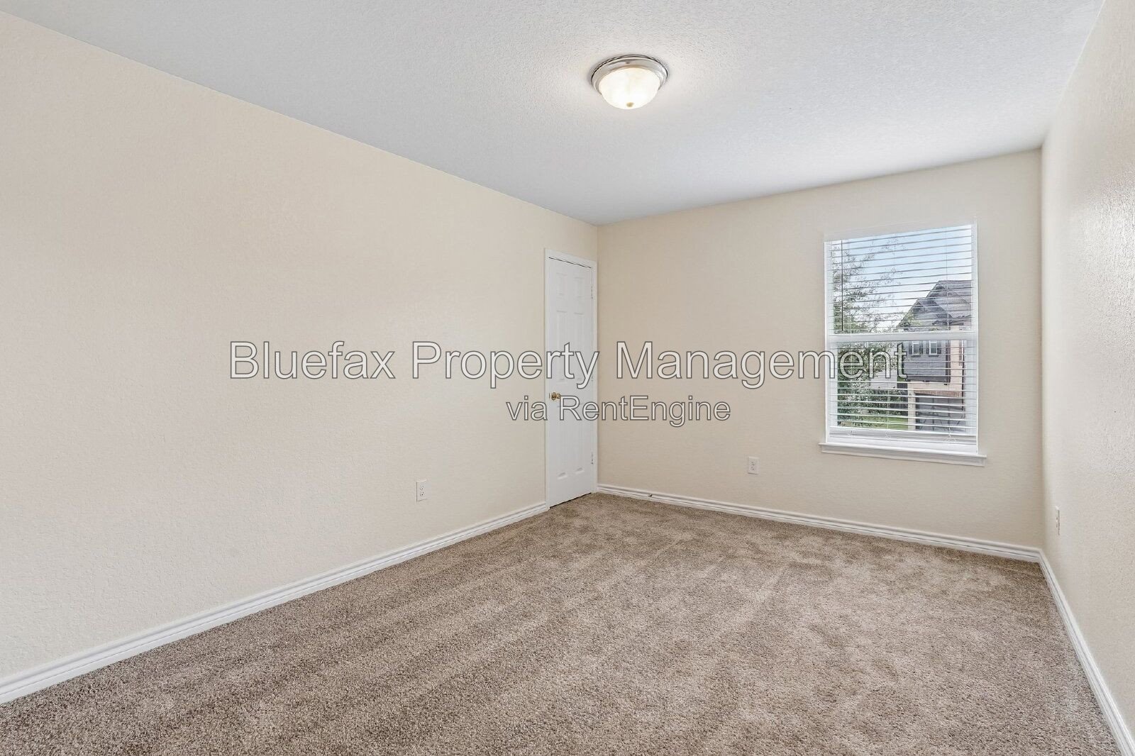 HUGE Covered Patio with Built In Counters, a Refrigerator and a Place for Your Grill! property image