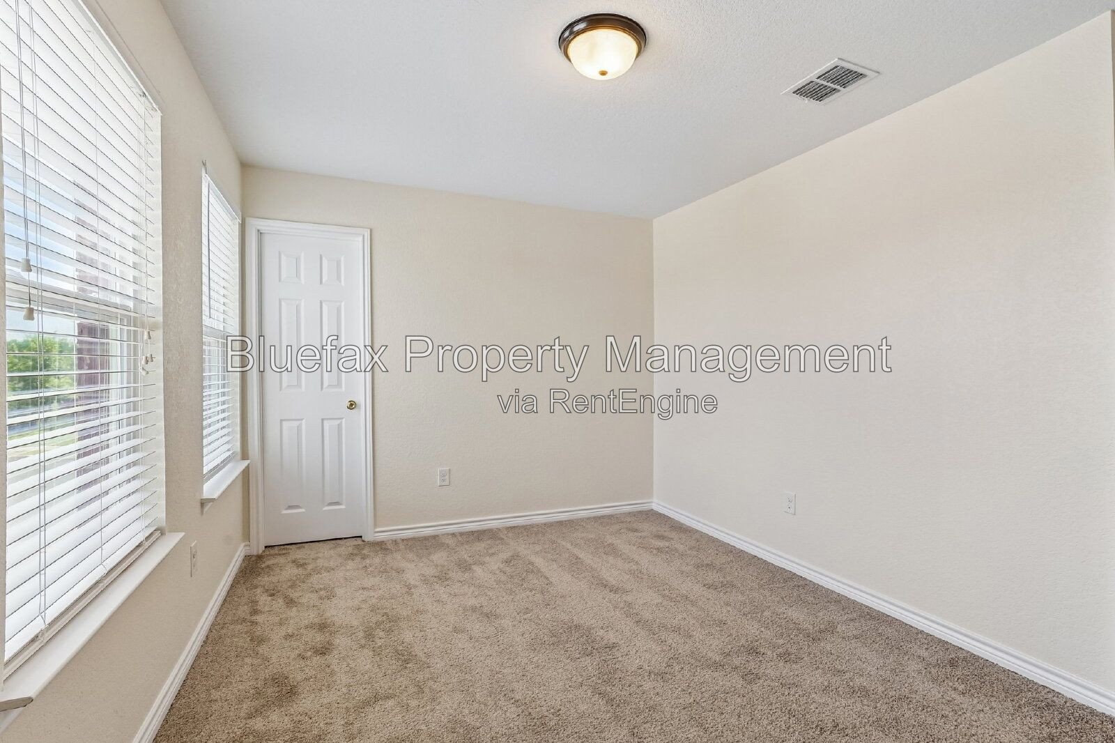 HUGE Covered Patio with Built In Counters, a Refrigerator and a Place for Your Grill! property image