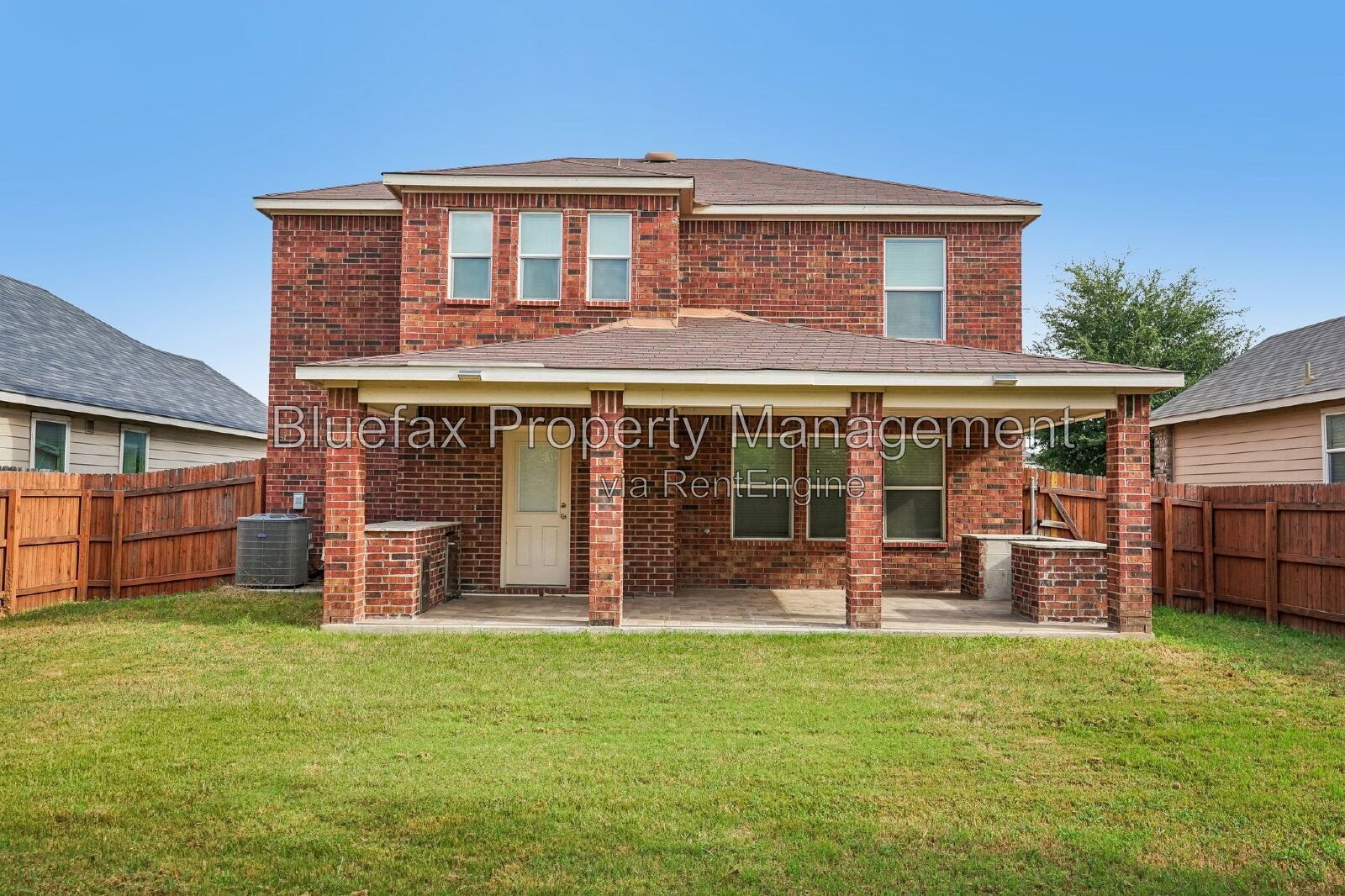 HUGE Covered Patio with Built In Counters, a Refrigerator and a Place for Your Grill! property image