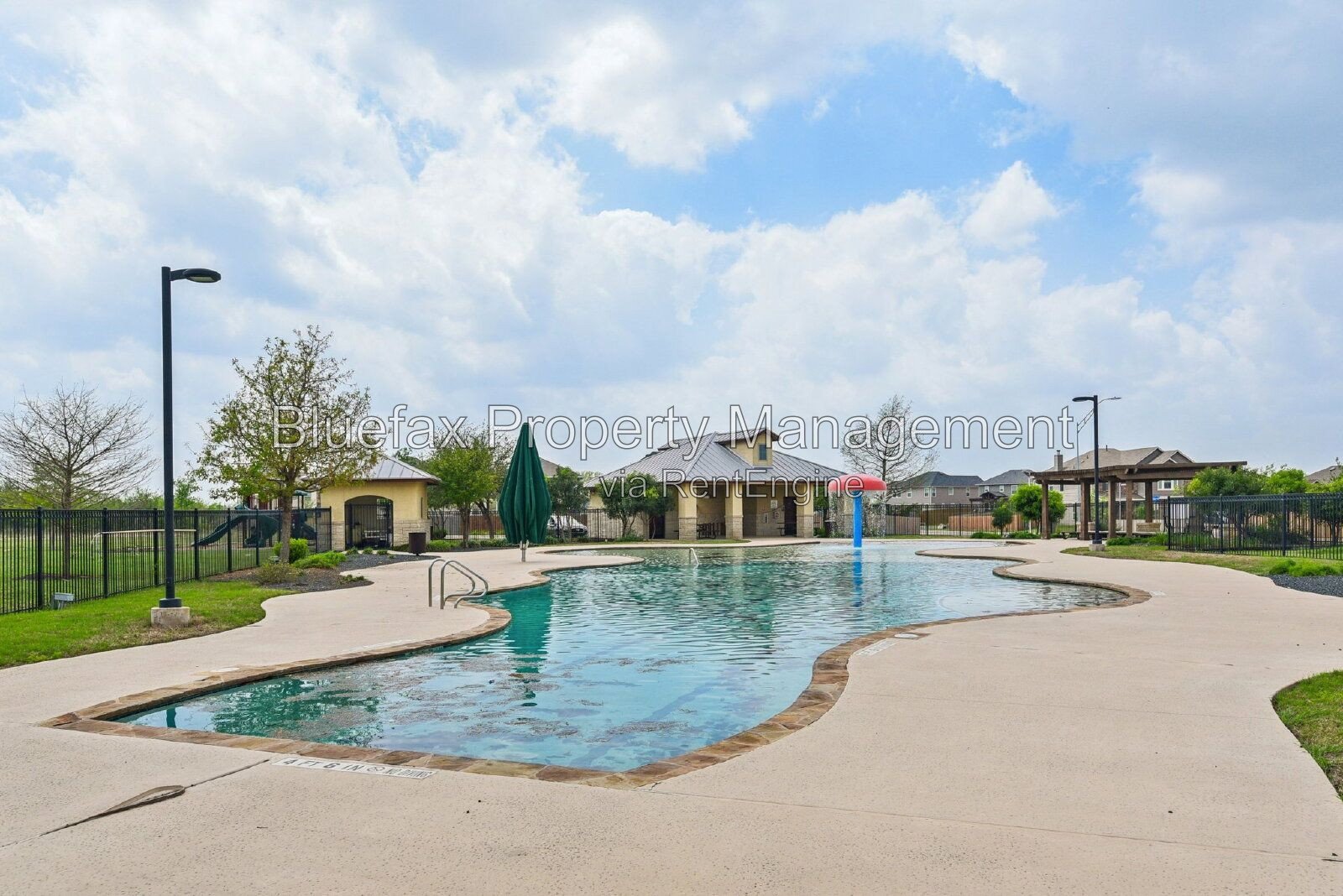 HUGE Covered Patio with Built In Counters, a Refrigerator and a Place for Your Grill! property image